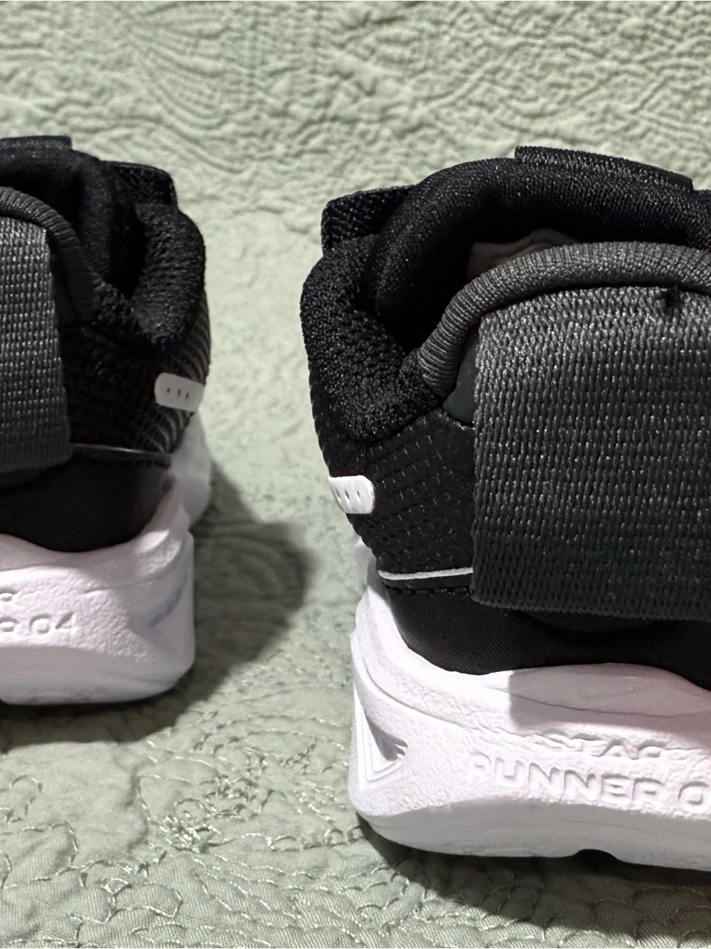 Nike Star Runner 4. Size 5c Black and white